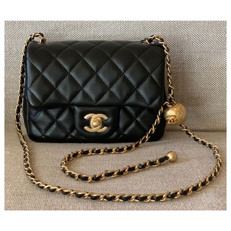 mini classic flap pearl bag chanel price|Chanel classic flap new mini.